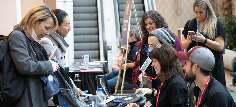 2019 Annual Conference volunteers check in attendees